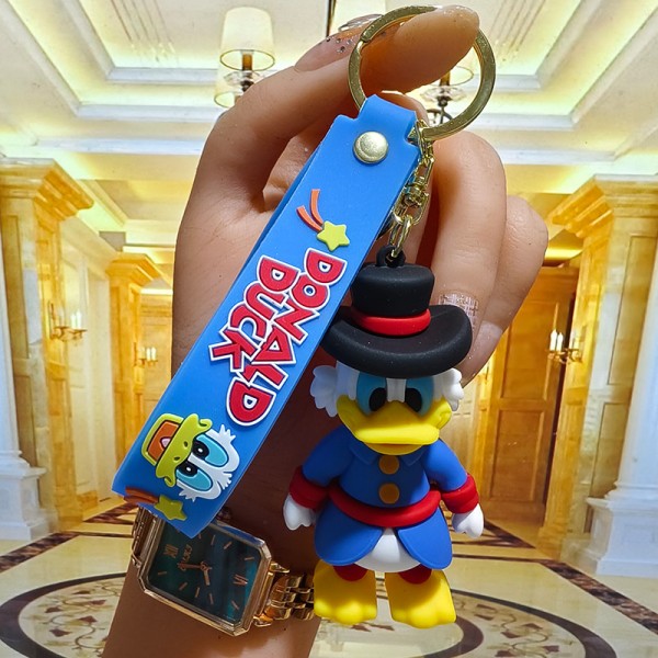 Брелок Дональд Дак Дісней Скрудж Макдак на ключі, на сумку фігурка іграшка антистрес 7 см