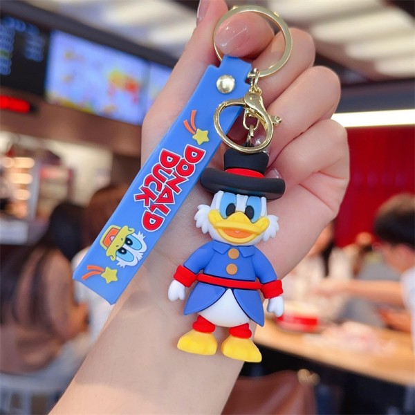 Брелок Дональд Дак Дісней Скрудж Макдак на ключі, на сумку фігурка іграшка антистрес 7 см